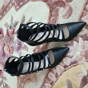 Rossini Black Faux Leather 4 Inch Strapped Heels by Aldo